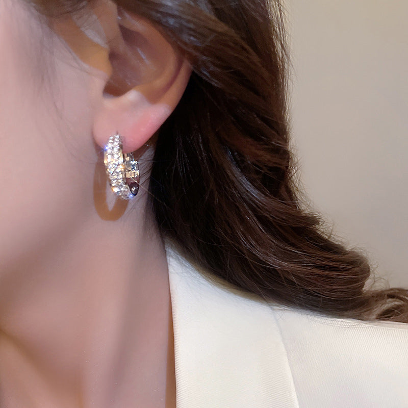 Liten funkelnde Ohrringe