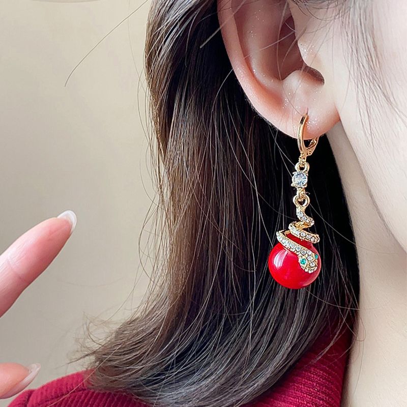 🐍Nyårsrea🎀Förgyllda örhängen med ormpärla