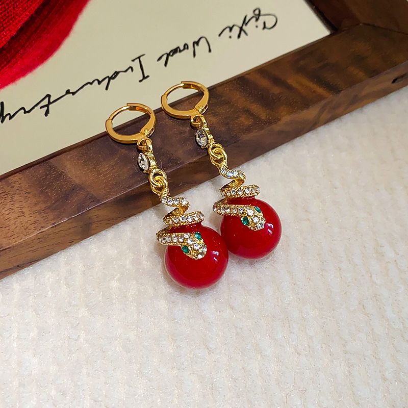 🐍Nyårsrea🎀Förgyllda örhängen med ormpärla