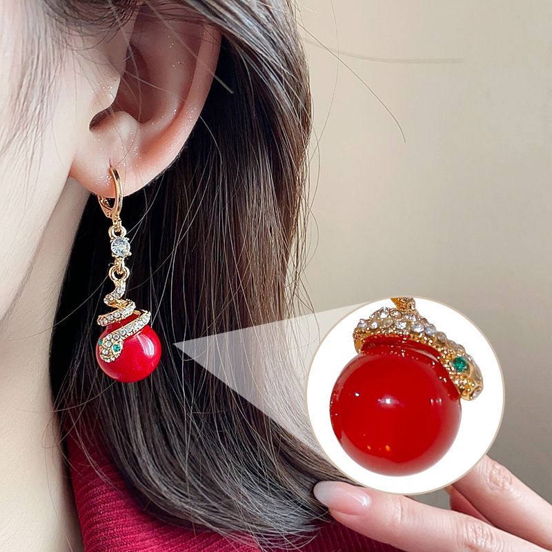 🐍Nyårsrea🎀Förgyllda örhängen med ormpärla