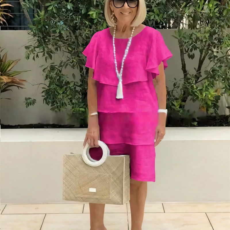 Kortärmad knälång chiffongklänning med volangdetaljer