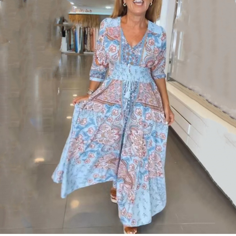 🌸 Damers eleganta långa klänning med blomtryck och dragsko