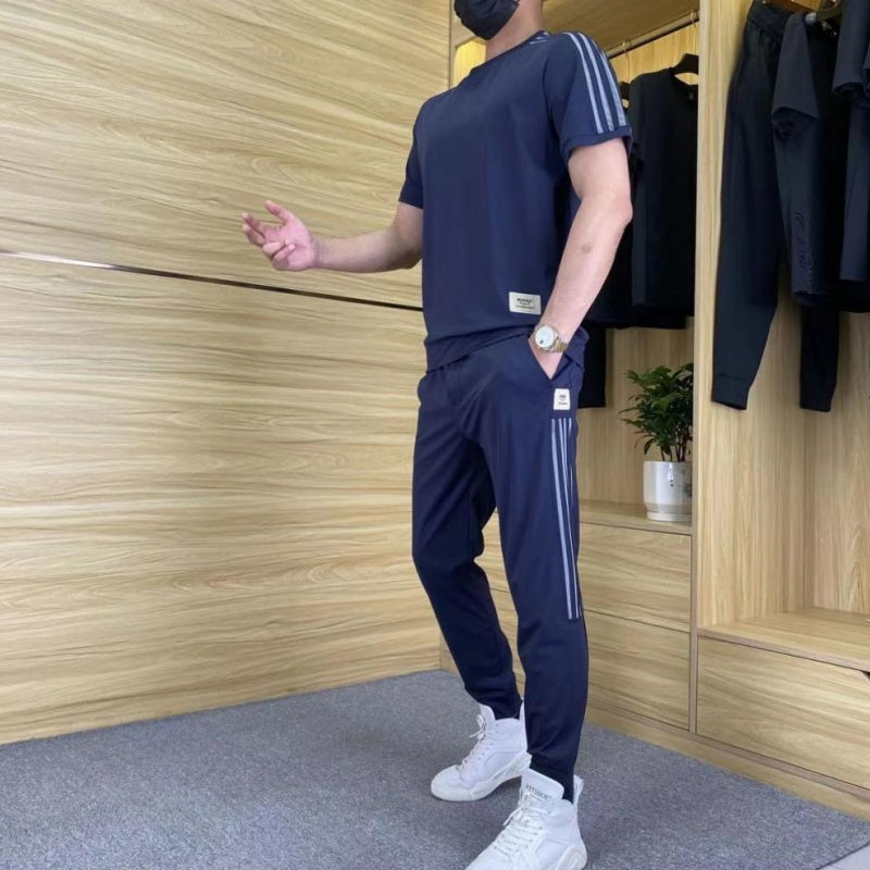 2-delat set med kortärmad topp och joggingbyxor med hög stretch för män