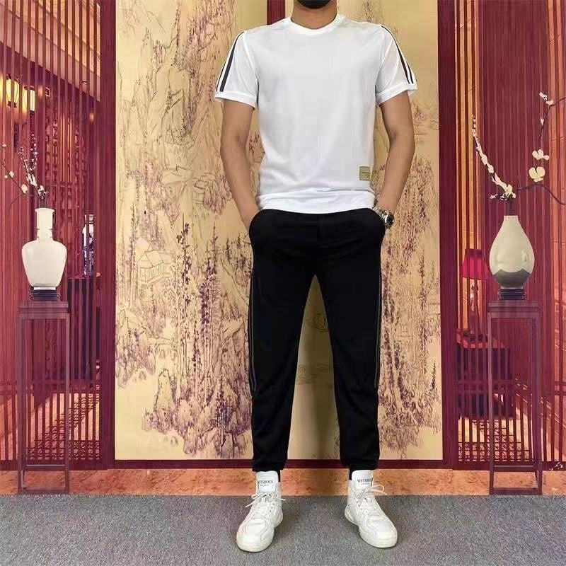 2-delat set med kortärmad topp och joggingbyxor med hög stretch för män