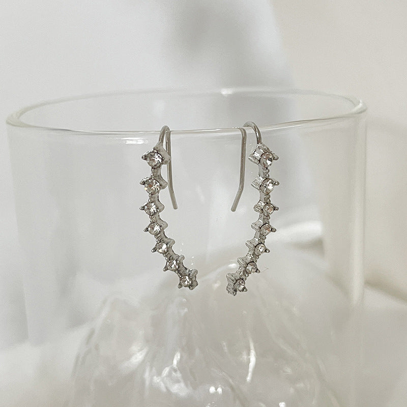 Säästä 49% alennusSeitsemän tähden timantti korvakorua.