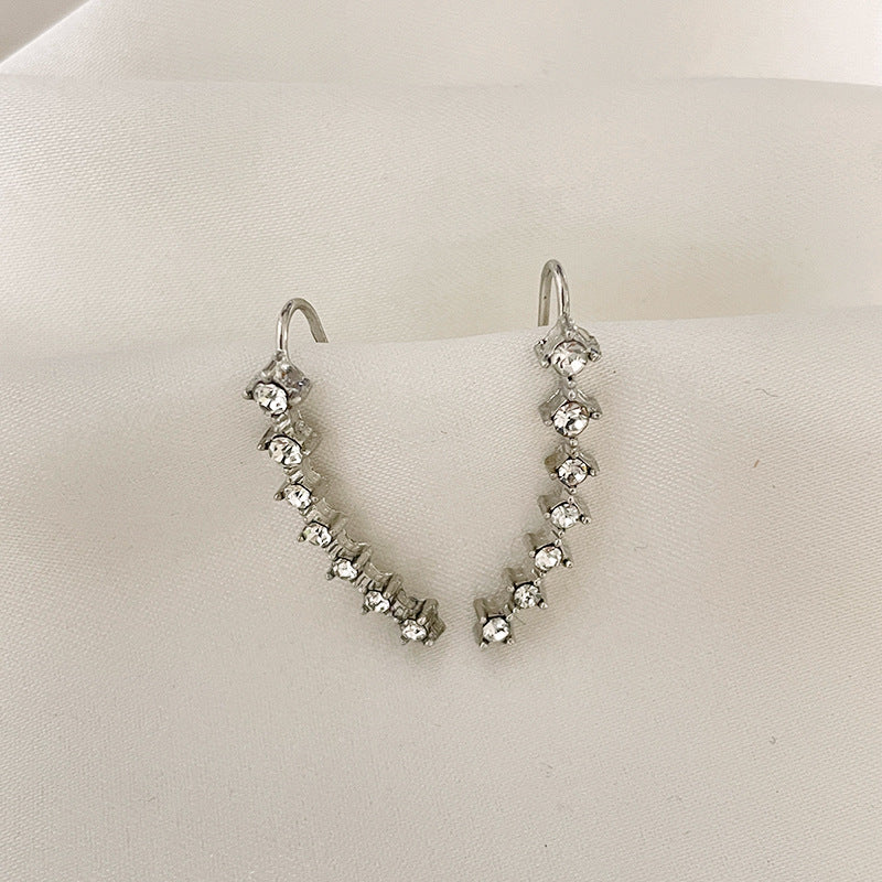 Säästä 49% alennusSeitsemän tähden timantti korvakorua.