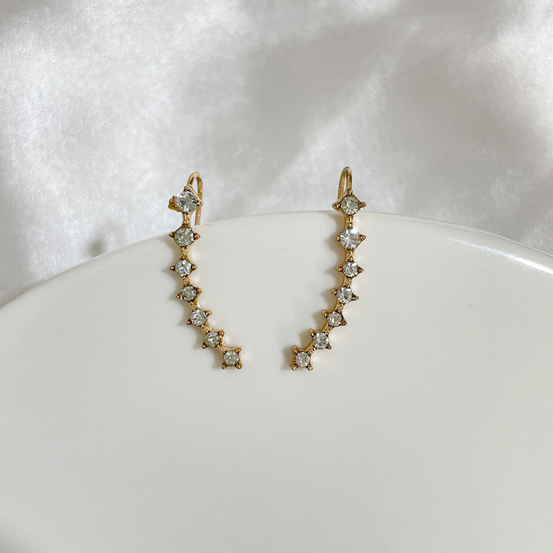 Säästä 49% alennusSeitsemän tähden timantti korvakorua.